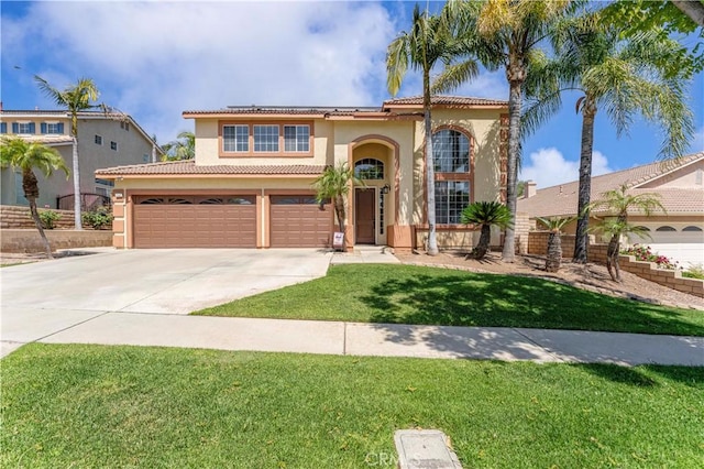 3582 Cedar Ridge Ln, Corona, CA 92881 - mediterranean / spanish-style house with stucco siding, driveway, an attached garage, and a front yard
