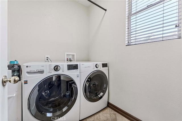 3582 Cedar Ridge Ln, Corona, CA 92881 - laundry room with independent washer and dryer, light tile patterned floors, and baseboards
