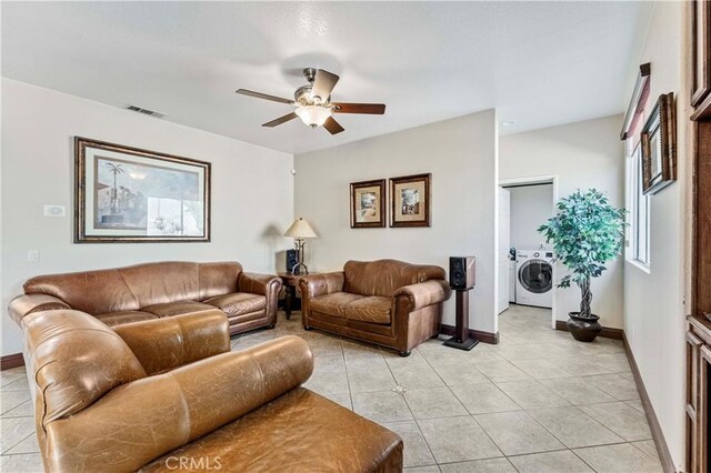3582 Cedar Ridge Ln, Corona, CA 92881 - living area featuring washer / dryer, a ceiling fan, light tile patterned flooring, and baseboards