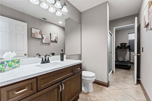 3582 Cedar Ridge Ln, Corona, CA 92881 - bathroom featuring vanity, toilet, a shower stall, and tile patterned flooring