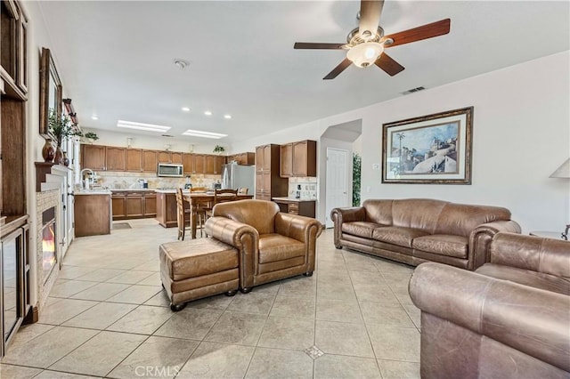 3582 Cedar Ridge Ln, Corona, CA 92881 - living area with light tile patterned flooring, a ceiling fan, and recessed lighting