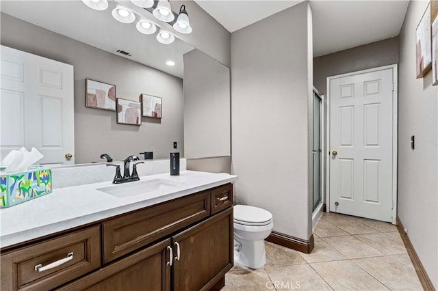 3582 Cedar Ridge Ln, Corona, CA 92881 - bathroom featuring vanity, toilet, a shower stall, tile patterned floors, and baseboards