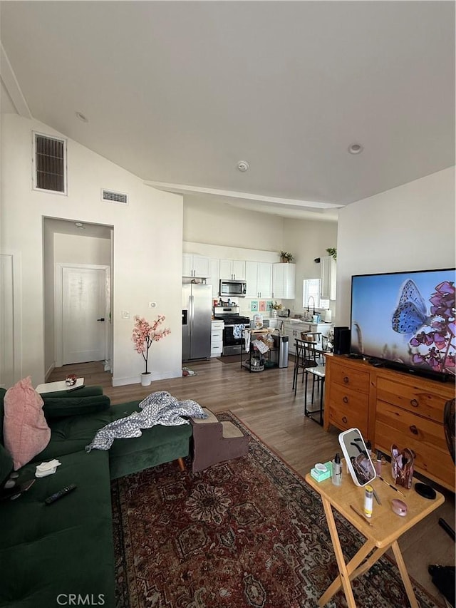 18649 Willard St, Reseda, CA 91335 - living room with wood finished floors and high vaulted ceiling