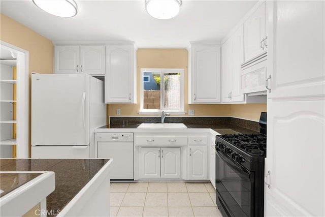 20632 Egret Ln, Huntington Beach, CA 92646 - kitchen featuring white appliances, a sink, white cabinets, and light tile patterned flooring