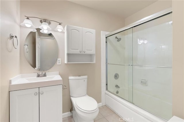 20632 Egret Ln, Huntington Beach, CA 92646 - bathroom with toilet, vanity, enclosed tub / shower combo, and tile patterned flooring