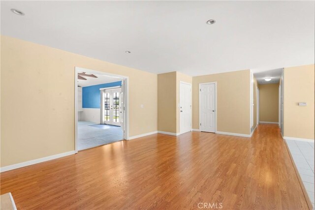 20632 Egret Ln, Huntington Beach, CA 92646 - unfurnished room with light wood-style flooring and baseboards