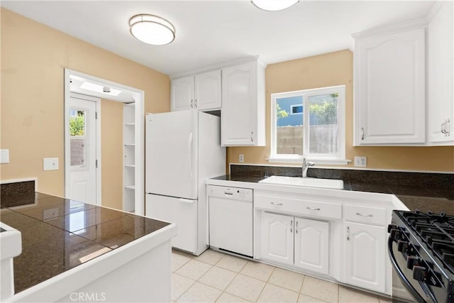 20632 Egret Ln, Huntington Beach, CA 92646 - kitchen featuring white appliances, a sink, tile counters, and white cabinets