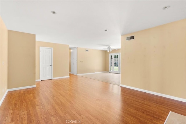 20632 Egret Ln, Huntington Beach, CA 92646 - spare room with light wood-style floors, baseboards, and ceiling fan