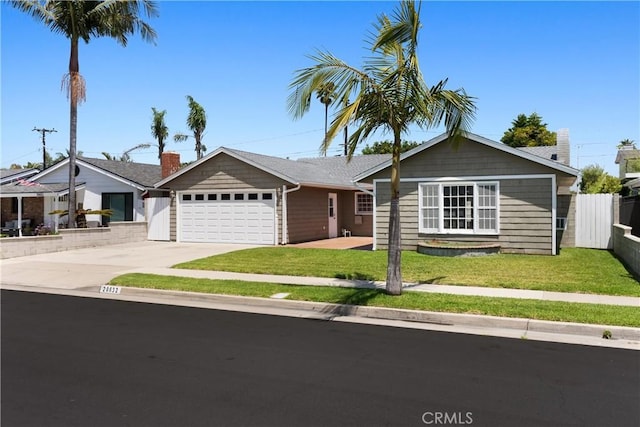 20632 Egret Ln, Huntington Beach, CA 92646 - ranch-style home with a garage and concrete driveway