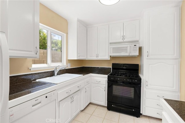 20632 Egret Ln, Huntington Beach, CA 92646 - kitchen featuring white appliances, a sink, white cabinetry, and dark countertops