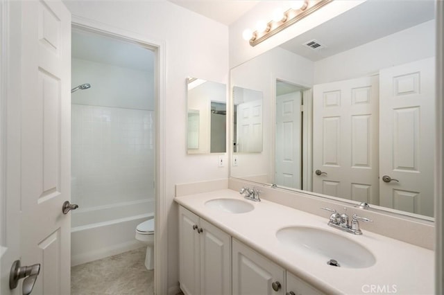 33850 Sattui St, Temecula, CA 92592 - full bathroom featuring toilet, double vanity, washtub / shower combination, and tile patterned flooring