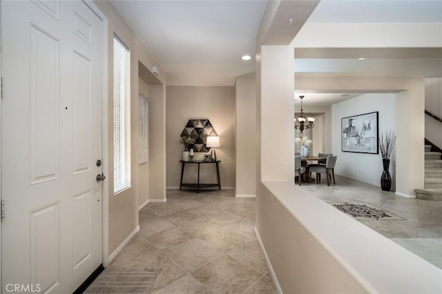33850 Sattui St, Temecula, CA 92592 - entrance foyer featuring stairway, a chandelier, baseboards, and recessed lighting