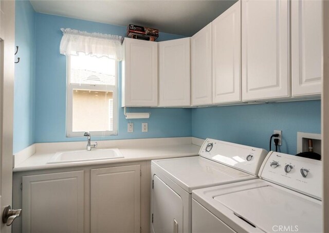 33850 Sattui St, Temecula, CA 92592 - laundry area with washing machine and dryer and cabinet space