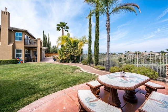 33850 Sattui St, Temecula, CA 92592 - view of yard featuring a patio and a balcony