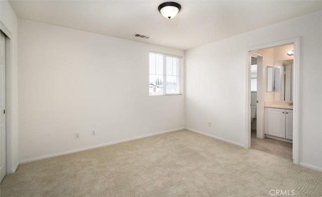 33850 Sattui St, Temecula, CA 92592 - unfurnished bedroom featuring light carpet and ensuite bathroom