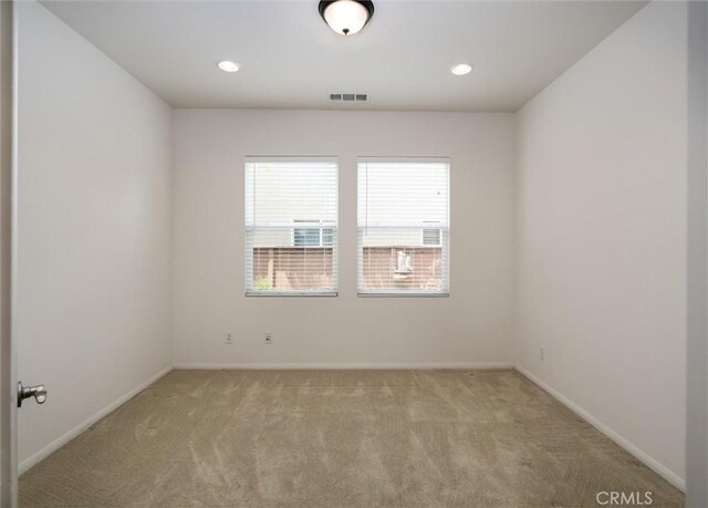33850 Sattui St, Temecula, CA 92592 - spare room featuring light colored carpet, baseboards, and recessed lighting