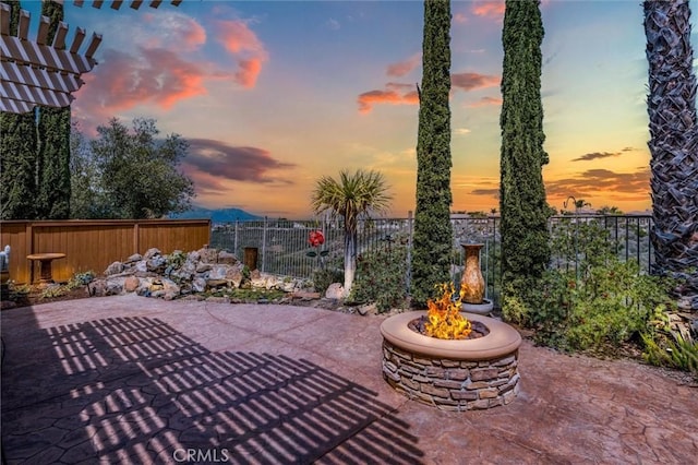 33850 Sattui St, Temecula, CA 92592 - fenced backyard with a patio and a fire pit