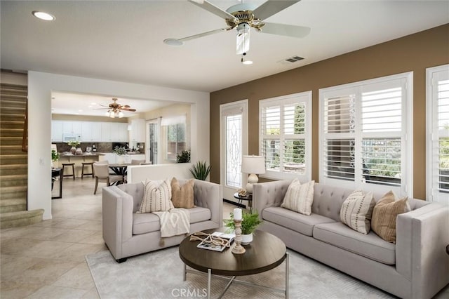 33850 Sattui St, Temecula, CA 92592 - living area featuring a ceiling fan, recessed lighting, stairs, and light tile patterned flooring