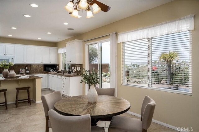 33850 Sattui St, Temecula, CA 92592 - dining area with recessed lighting, baseboards, light tile patterned floors, and ceiling fan