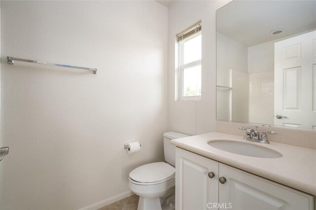 33850 Sattui St, Temecula, CA 92592 - bathroom featuring vanity, toilet, baseboards, and tile patterned floors
