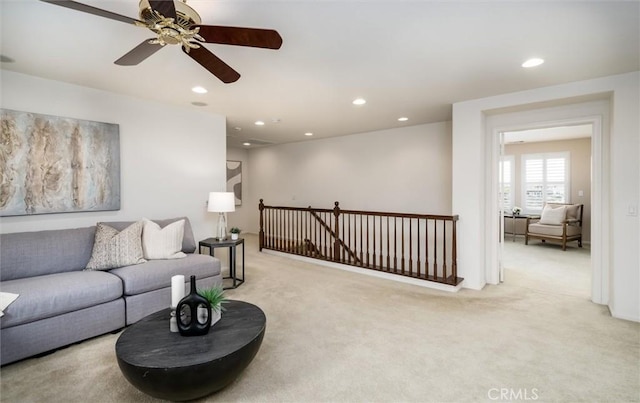 33850 Sattui St, Temecula, CA 92592 - living area with light colored carpet, recessed lighting, and ceiling fan