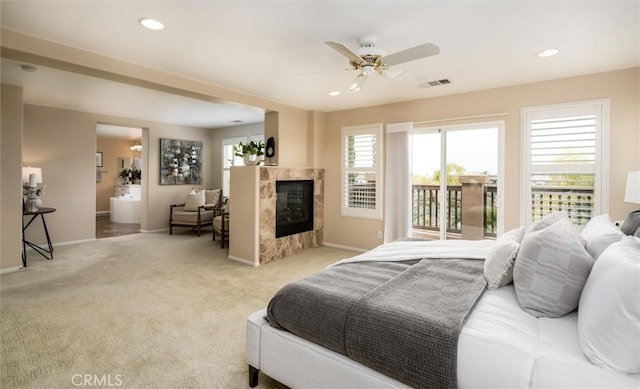 33850 Sattui St, Temecula, CA 92592 - bedroom featuring access to exterior, light colored carpet, a fireplace, recessed lighting, and ceiling fan