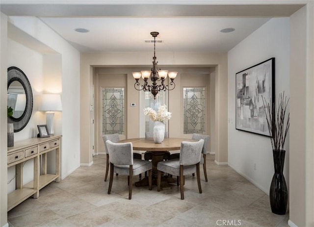 33850 Sattui St, Temecula, CA 92592 - dining area featuring a chandelier and baseboards