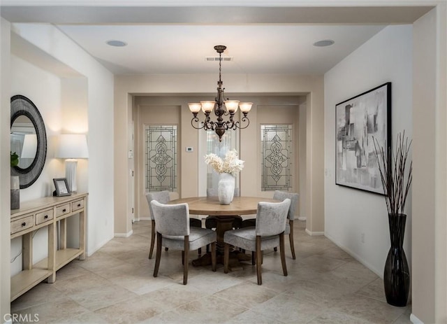 33850 Sattui St, Temecula, CA 92592 - dining room featuring a chandelier and baseboards