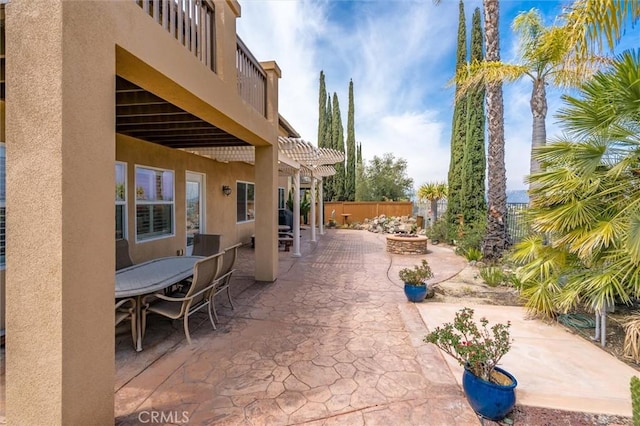 33850 Sattui St, Temecula, CA 92592 - view of patio with a pergola, outdoor dining space, and an outdoor fire pit