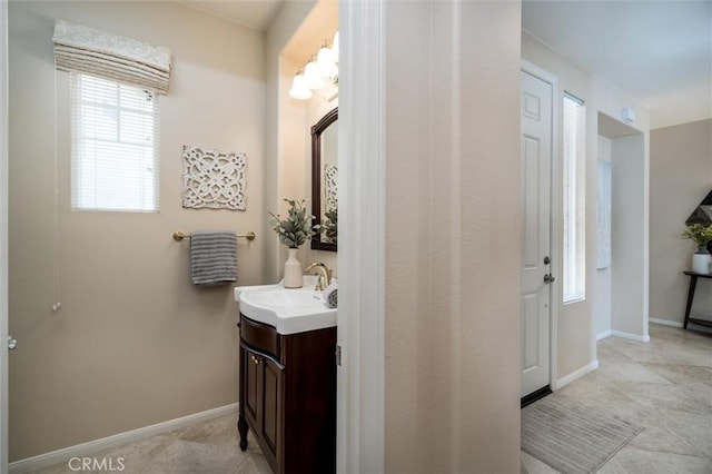 33850 Sattui St, Temecula, CA 92592 - bathroom with vanity and baseboards