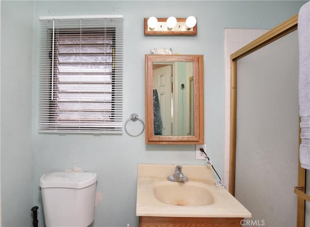 10108 Roseton Ave, Santa Fe Springs, CA 90670 - full bath with vanity, toilet, and a shower with shower door