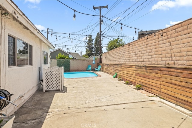 15113 Hayford St, La Mirada, CA 90638 - view of swimming pool featuring a fenced backyard and a patio area
