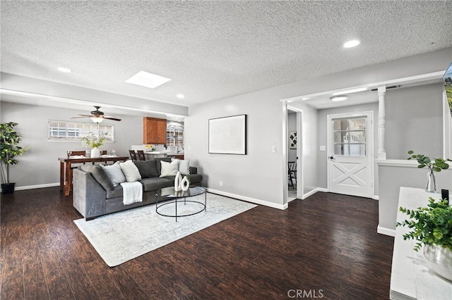 15113 Hayford St, La Mirada, CA 90638 - living room with wood finished floors, a textured ceiling, baseboards, recessed lighting, and ceiling fan