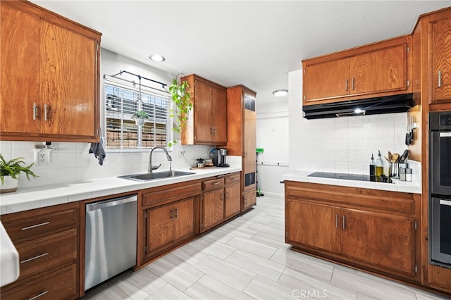 15113 Hayford St, La Mirada, CA 90638 - kitchen featuring a sink, dishwasher, under cabinet range hood, backsplash, and recessed lighting