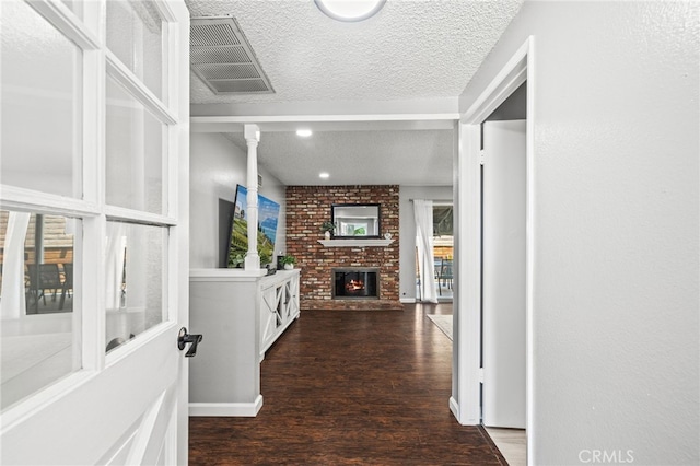 15113 Hayford St, La Mirada, CA 90638 - corridor featuring a textured ceiling, dark wood-type flooring, and baseboards