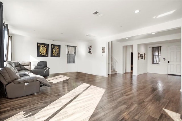 34048 Thistlewood Ave, Murrieta, CA 92563 - living room with recessed lighting, dark wood finished floors, and stairs