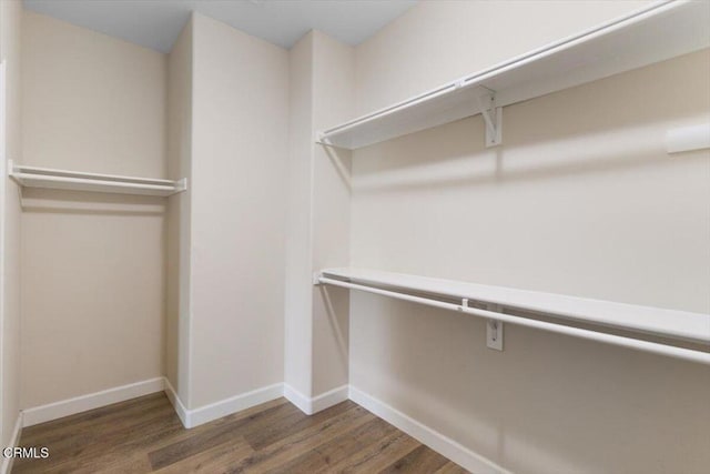 5611 Dorsey St, Ventura, CA 93003 - walk in closet featuring wood finished floors