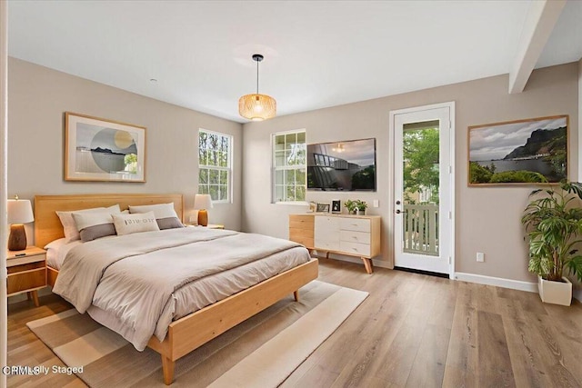 5611 Dorsey St, Ventura, CA 93003 - bedroom featuring access to exterior and light wood-type flooring