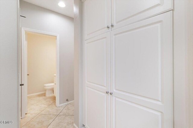 5611 Dorsey St, Ventura, CA 93003 - hallway with light tile patterned floors and recessed lighting