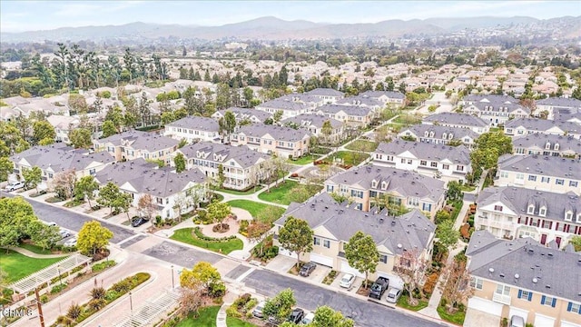5611 Dorsey St, Ventura, CA 93003 - aerial view of property and surrounding area featuring nearby suburban area and a mountainous background