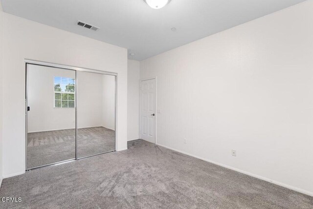 5611 Dorsey St, Ventura, CA 93003 - unfurnished bedroom featuring carpet and a closet