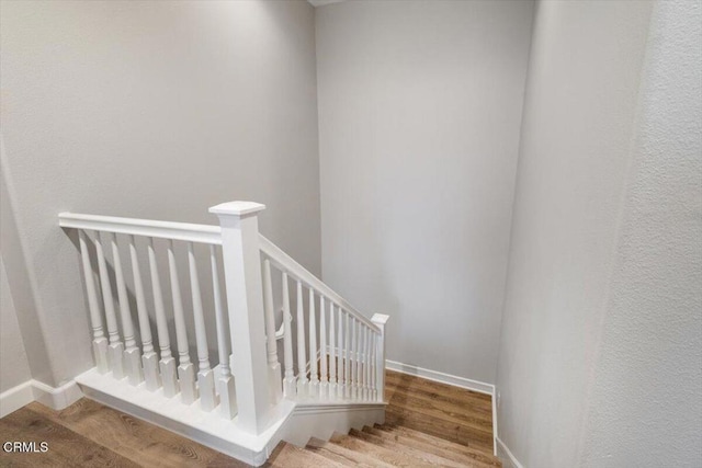 5611 Dorsey St, Ventura, CA 93003 - stairs featuring wood finished floors and baseboards