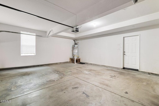 5611 Dorsey St, Ventura, CA 93003 - garage with a garage door opener and secured water heater