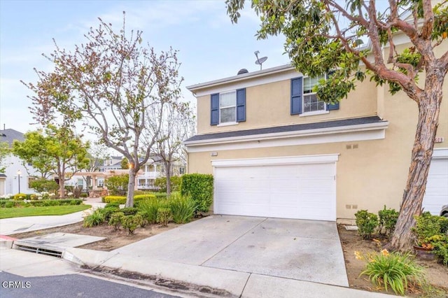 5611 Dorsey St, Ventura, CA 93003 - traditional-style home with a garage, stucco siding, and concrete driveway