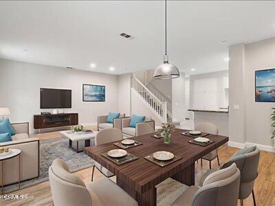 5611 Dorsey St, Ventura, CA 93003 - dining space featuring light wood finished floors, stairway, and recessed lighting