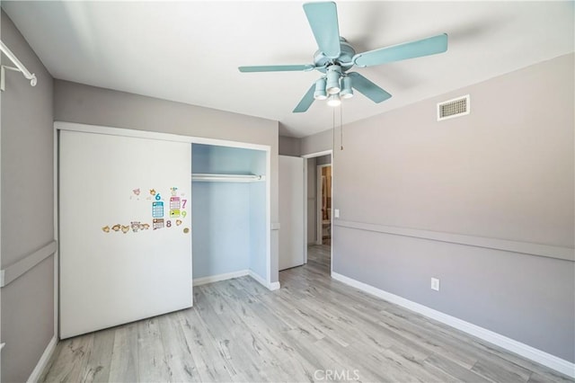 6114 Sard St, Rancho Cucamonga, CA 91701 - unfurnished bedroom featuring wood finished floors, a closet, baseboards, and a ceiling fan