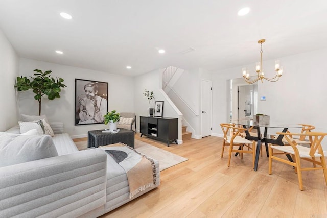 4532 Dawson Ave Unit 3, San Diego, CA 92115 - living room with stairway, recessed lighting, light wood finished floors, a chandelier, and baseboards