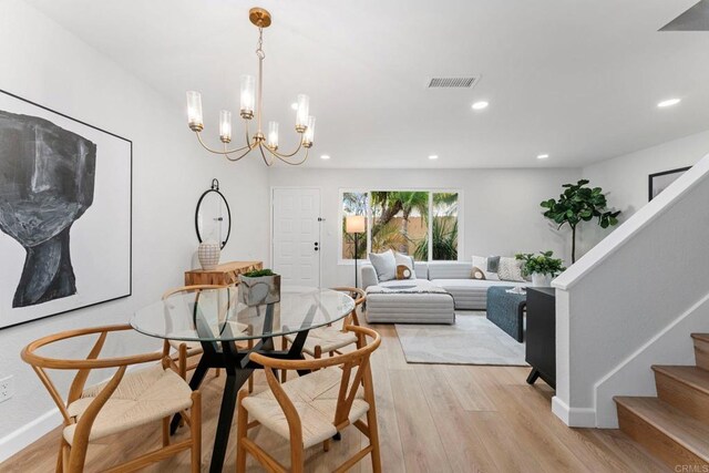 4532 Dawson Ave Unit 3, San Diego, CA 92115 - dining space featuring light wood-type flooring, recessed lighting, stairway, a chandelier, and baseboards