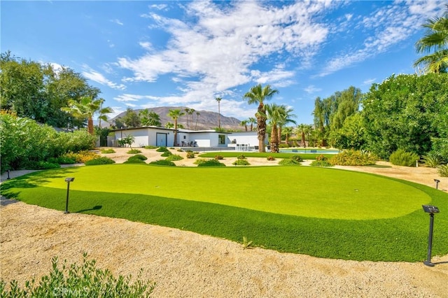 72408 Desert Dr, Rancho Mirage, CA 92270 - view of community with a putting green and a mountain view