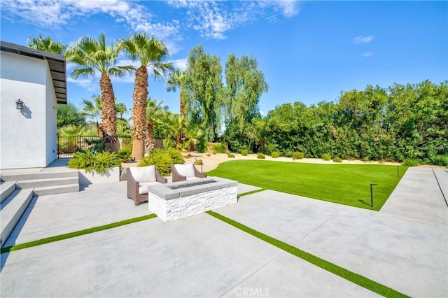 72408 Desert Dr, Rancho Mirage, CA 92270 - view of green lawn featuring a patio area and an outdoor living space